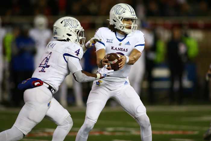 Kansas Jayhawks quarterback Jason Bean, running back Devin Neal, handoff